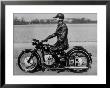 German Made Bmw Motorcycle With A Rider Dressed In Black Leather by Ralph Crane Limited Edition Pricing Art Print