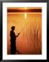 Silhouette Of Man Fishing, Vilas City, Wi by Ken Wardius Limited Edition Pricing Art Print
