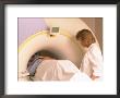 Technician Positioning Patient For Mri by Frank Pedrick Limited Edition Print
