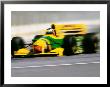 Yellow Race Car In Motion by Peter Walton Limited Edition Print