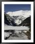 Lake Louise Is Just Beginning To Thaw In The Spring by Stephen Alvarez Limited Edition Print