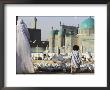Lady In Burqa Feeding Famous White Pigeons Whilst Child Chases Them, Balkh, Afghanistan by Jane Sweeney Limited Edition Print