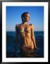 Young Woman Wearing Swimsuit On Beach In Water by David Marshall Limited Edition Print