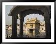 The Golden Temple Framed By The Arch Of A Small Pavilion by Maynard Owen Williams Limited Edition Pricing Art Print