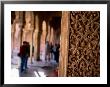 Carved Wall With Tourists In Background, Alhambra, Granada, Spain by John Banagan Limited Edition Print