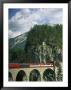 Train Passes Into A Tunnel In The Mountains Of Switzerland by Taylor S. Kennedy Limited Edition Print