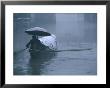 Man Rowing His Bamboo Boat In A Snow Storm, Shaoxing, China by Keren Su Limited Edition Print