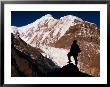 Lone Hiker Standing In Front Of Gangapurna, Annapurna Circuit, Manang, Nepal by Andrew Parkinson Limited Edition Print