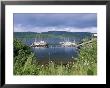 Rainbow Arcs Above Sailboats Moored In Thorne Bay, Alaska by Rich Reid Limited Edition Pricing Art Print