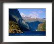 Boat In Distance Between Mountains, Milford Sound, New Zealand by Peter Hendrie Limited Edition Pricing Art Print