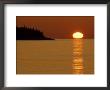 Spring Sunrise Silhouettes Edwards Island And Reflects Light On Lake Superior by Mark Carlson Limited Edition Print