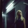 A Young Blonde Woman Standing In A Dark Alleyway by Jewgeni Roppel Limited Edition Print