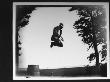 Edgar J. Taylor Caught In Mid-Air Jumping Off A Barrel by Wallace G. Levison Limited Edition Pricing Art Print