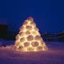 A Light Inside Of A Pyramid Made Out Of Snowballs by Ove Eriksson Limited Edition Print