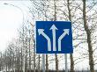 A Traffic Sign By A Row Of Trees And A Lamp Post by Bragi Thor Josefson Limited Edition Print