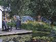 View Across Lily Pool To Deck With Adirondack Chairs, In The Background Is The Main Greenhouse by Clive Nichols Limited Edition Print