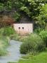 Grey Slate Path Leads To Pink Rendered Cement Water Feature, Designer: Charlotte Sanderson by Clive Nichols Limited Edition Print