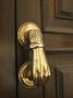Cordoba, Andalucia, Spain, - Detail Of A Brass Door Knocker In The Form Of A Hand by Colin Dixon Limited Edition Print