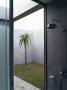 Cooper Residence, Omaha Beach, New Zealand, Indoor Shower With View To Garden by Richard Powers Limited Edition Print