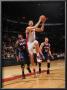 Atlanta Hawks V Toronto Raptors: Andrea Barngani And Josh Smith by Ron Turenne Limited Edition Print