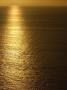 Fishing Boat In Distance On Sea At Sunset, Manabi Province, Ecuador by Pete Oxford Limited Edition Print