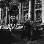 Martine Carol With Christian-Jaque Standing By The Trevi Fountain In Rome by Benno Graziani Limited Edition Print