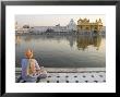 Sikh Pilgrim Sitting By Holy Pool, Golden Temple, Amritsar, Punjab State, India by Eitan Simanor Limited Edition Print