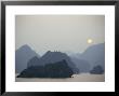 Sunset Against Limestone Grotto Islands, Halong Bay, Vietnam, Indochina, Southeast Asia by Alison Wright Limited Edition Print