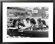 Teenage Girls Enjoying Milkshakes At Drive In Restaurant by Nina Leen Limited Edition Print