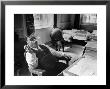 Mayor Fiorello Laguardia Blowing Smoke Rings Sitting At Desk In His Office by William C. Shrout Limited Edition Print