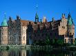 Exterior Of Egeskov Slot (Palace), Funen, Denmark by Jon Davison Limited Edition Print