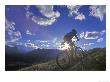 Mountain Biker At Sunset, Canmore, Alberta, Canada by Chuck Haney Limited Edition Print