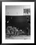 Coach Jess Hill, Leading The Track Team's Practice by John Florea Limited Edition Print