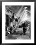 Sunlight Streaming Down From Holes In Roof On Vendors In Covered Bazaar by Alfred Eisenstaedt Limited Edition Print