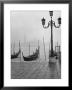 Moored Gondolas On A Foggy Grand Canal With Santa Maria Della Salute Church In The Background by Dmitri Kessel Limited Edition Pricing Art Print