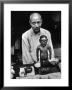 Old Style Chinese Doctor Setting Up His Office On Street During Market Day by Carl Mydans Limited Edition Print
