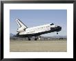 Space Shuttle Endeavour's Main Landing Gear Touches Down On The Runway by Stocktrek Images Limited Edition Print