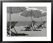 Sun Umbrellas And Lawn Chairs On A Beach by Vincenzo Balocchi Limited Edition Print