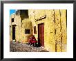 Old Town Building Facade And Motor Scooter, Rhodes, Southern Aegean, Greece by Christopher Groenhout Limited Edition Print