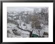 Winter Snows Begin To Fall On Village, Transylvania by Gavin Quirke Limited Edition Print