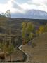 Winding Irrigation Ditch On A Hillside In Mustang, Nepal by Stephen Sharnoff Limited Edition Print