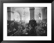 Interior Of Munich Beer Hall, People Sitting At Long Tables, Toasting by Ralph Crane Limited Edition Print