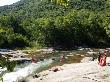 Tourists Doing White Water Tubing In Sabi River, Mpumalanga, South Africa by Roger De La Harpe Limited Edition Print