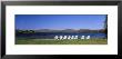 Group Of Lounge Chairs Near A Lake, Blue Mountain Lake, New York State, Usa by Panoramic Images Limited Edition Print