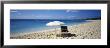 Single Beach Chair And Umbrella On Sand, Saint Martin, French West Indies by Panoramic Images Limited Edition Print
