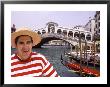 Gondolier By The Rialto Bridge, Venice, Italy by Bill Bachmann Limited Edition Print