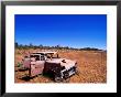 Abandoned Old Holden Car On Mereenie Loop Road, Australia by Christopher Groenhout Limited Edition Print