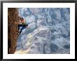 A Man Climbing A Rock Face At Hueco Tanks by Bill Hatcher Limited Edition Pricing Art Print