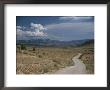 Dirt Road To A Ranch In The Desert Hills Near The Grand Canyon by Todd Gipstein Limited Edition Pricing Art Print