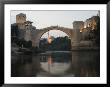 Stari Most Peace Bridge And Reflection Of Mosque On Neretva River, Bosnia, Bosnia-Herzegovina by Christian Kober Limited Edition Print